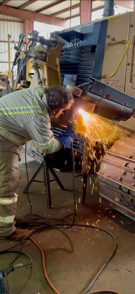 Mobile service truck and dozer repair on a job site in Phoenix Metro